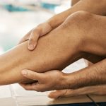 Legs injury, swimming and sports person massage calf problem from exercise, training or workout cri