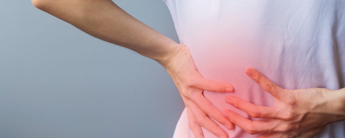 woman have back body ache due to Piriformis, Low Back Pain, Spinal Compression and Office syndrome